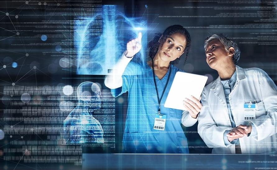 Two doctors analyzing clinical data on digital tablet in real-world medical scenario
