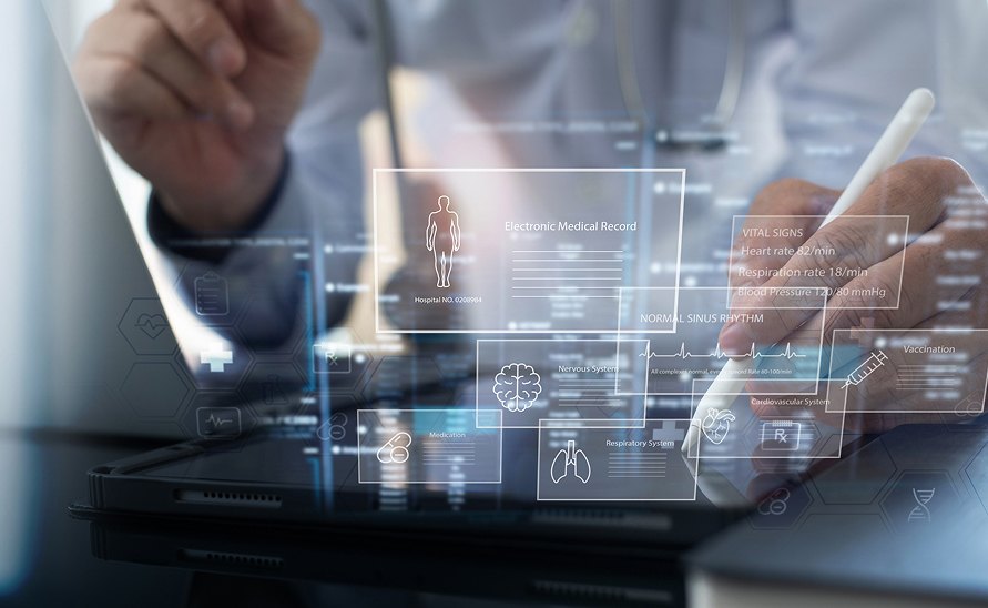 Doctor holding tablet with digital icons representing complete patient health view