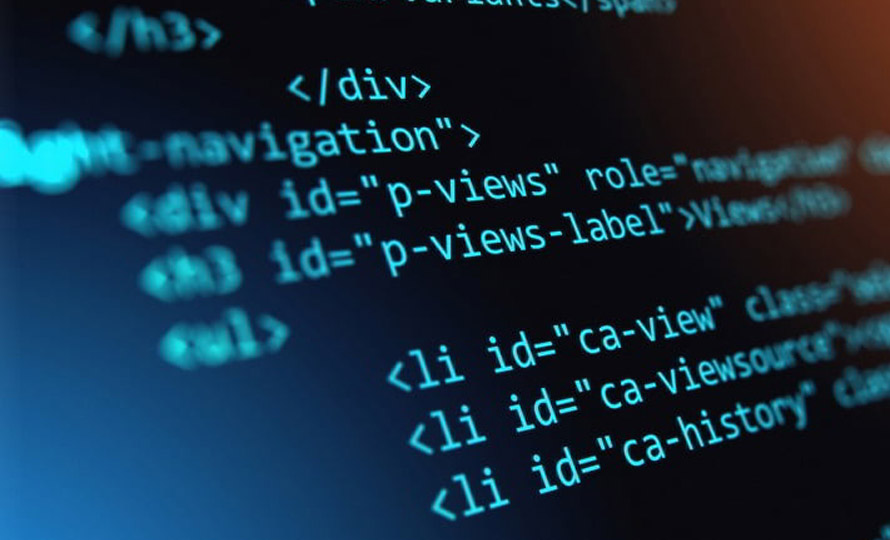 Close-up of computer code displayed on a screen, representing software development and data processing.
